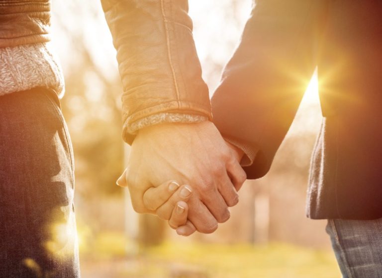 couple-holding-hands-1200x796